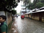 টানা বর্ষণে মাদারীপুর হাটু পানির নিচে
