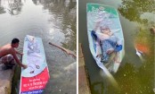 প্রধানমন্ত্রীর ছবি পুকুরে
