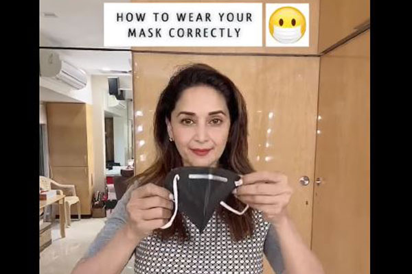 কীভাবে মাস্ক পড়তে হয়, শেখালেন মাধুরী (ভিডিও)