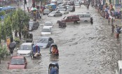 সকাল থেকে ঢাকায় বৃষ্টি, পানিতে ডুবে গেছে সড়ক